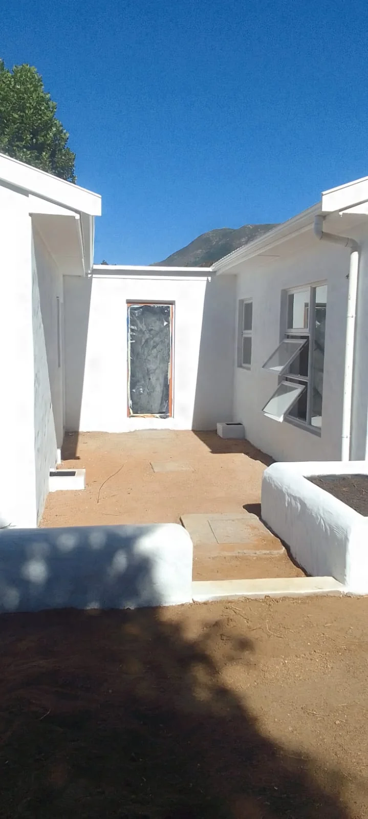 Roof cleaning and painting before and after transformation